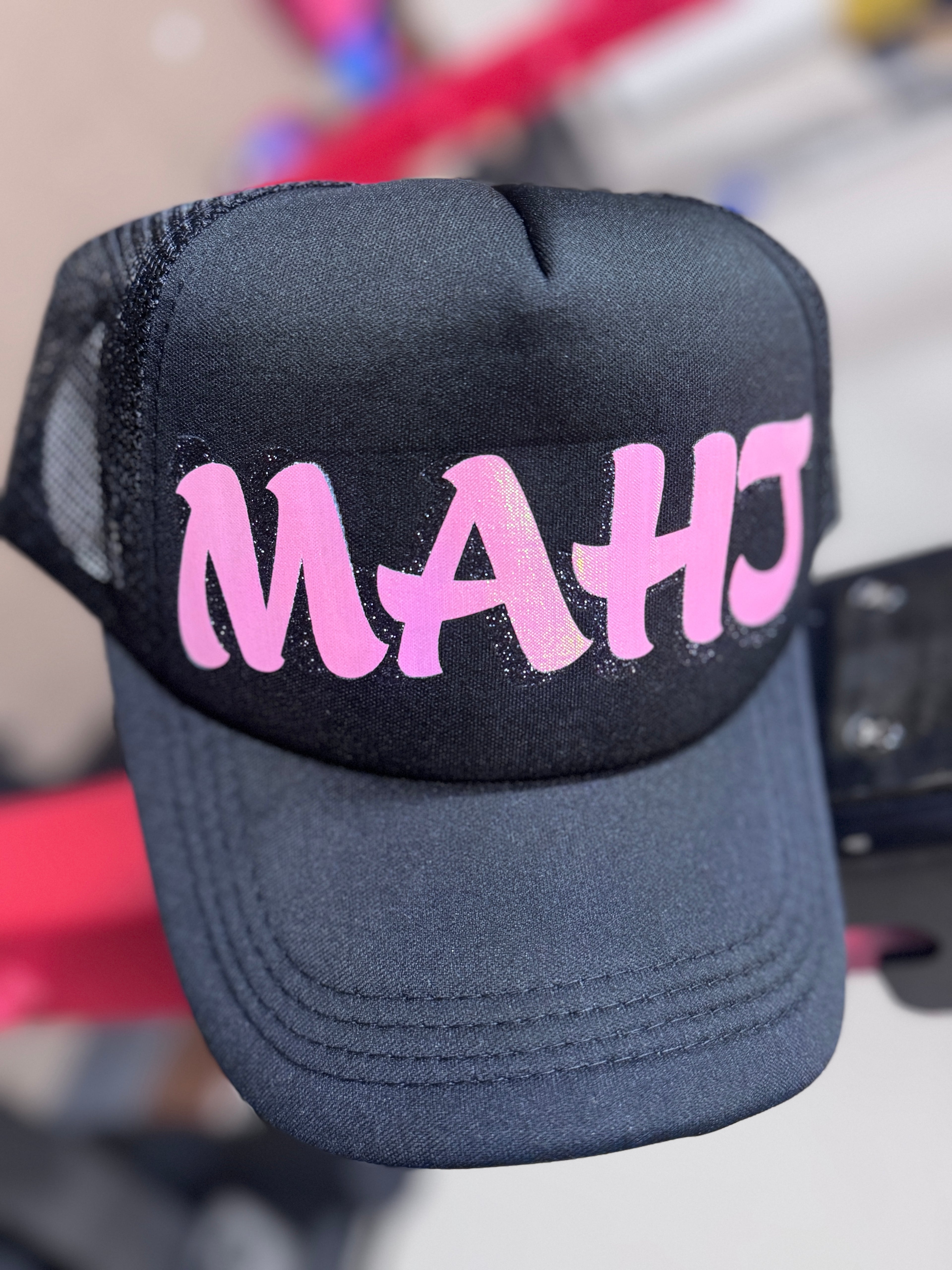 MAHJONG "MAHJ" Black Trucker Hat with Aurora Pink Print